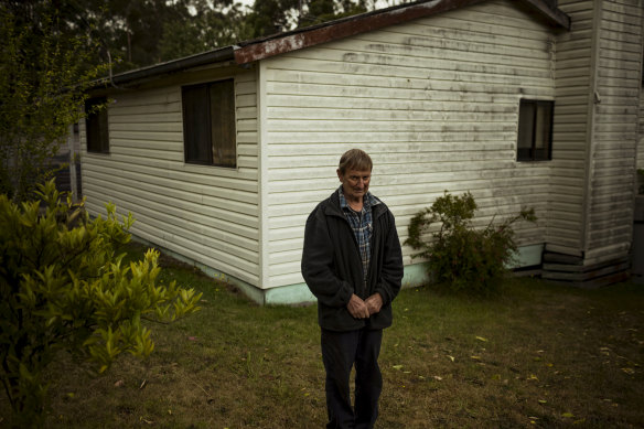 Nowa Nowa resident Robert Cellar used a hose to defend his home.