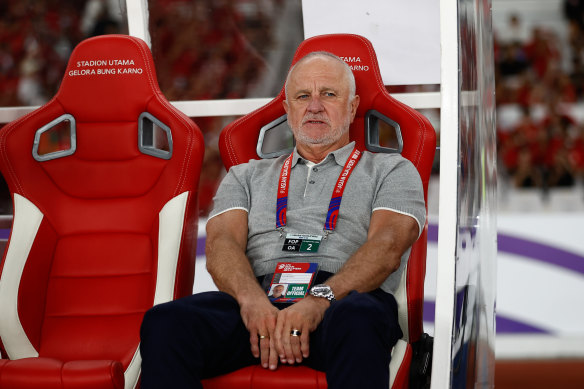Graham Arnold deals with more dejection against Indonesia from the dugout in Jakarta.
