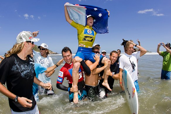 Mick Fanning wins his first world surfing title, Brazil, in 2007. (Before his victory that day, his surfboard was nudged by a dolphin, which he believes was his late brother Sean.)