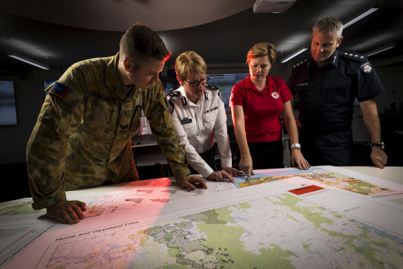 Sergeant Ryan Hodgson from the Australian Army, Deputy Emergency Management Commissioner Deb Abbott, the Red Cross' Kate Siebert and  Victoria Police Inspector Craig Shepherd.