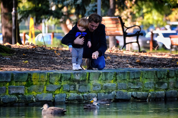 Watching the ducks at Caulfield Park lake was a popular pastime.