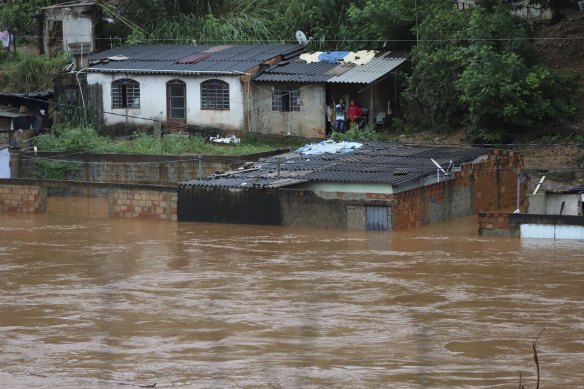 A view of flooded houses caused by heavy rains in Sabara municipality, Minas Gerais state, Brazil on Friday.