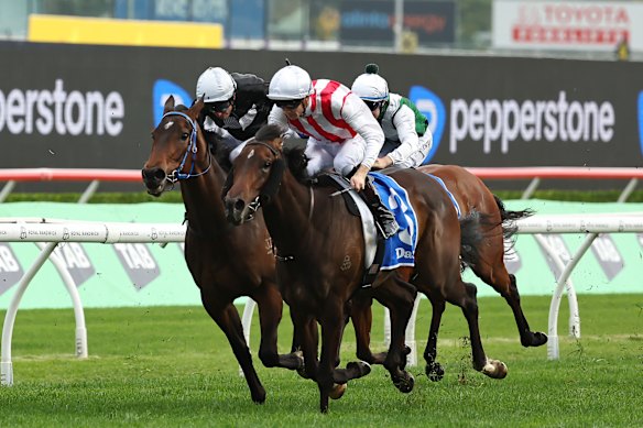 Global Goal (right) wins the Flight Stakes in impressive fashion at Randwick on October 3. 