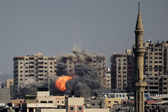 An explosion on a residential tower caused by Israeli raids in the northern Gaza Strip.