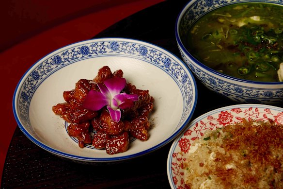 Clockwise from left: Sweet and sour pork; red emperor under fragrant green chilli; and conpoy and egg white fried rice.