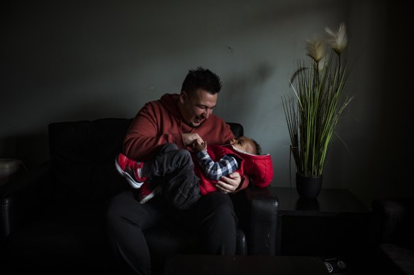Formerly homeless youth Luis Montero with his son Andre.