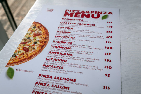 A menu featuring the Trumpino pizza at the Trump Pizza Station in Kyiv, Ukraine.