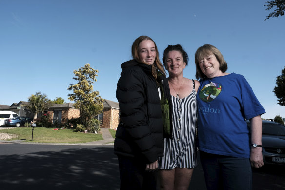 Thank you: Tanya Holmes, centre, and her daughter Staci, 13, with Debbie Holmes, right, who helped fund the purchase of this Narre Warren home for Tanya and three kids to rent. 