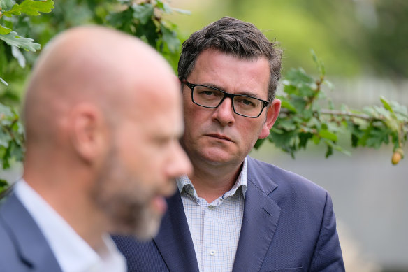 COVID-19 testing commander Jeroen Weimar (foreground) and Premier Daniel Andrews on Saturday.