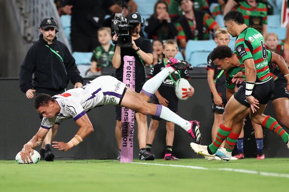 Will Warbrick dives in at the corner to score for the Storm.