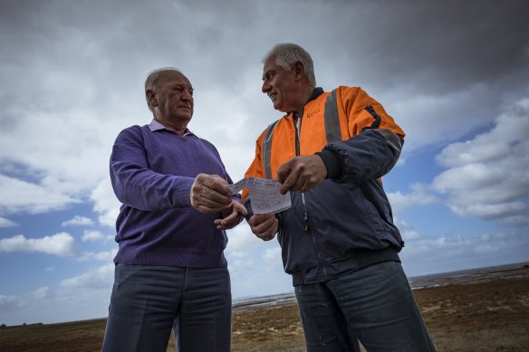 Retired salvage diver, Rod Knights (left) speaks with Kevin Hynes, the last living witness to the crashed Wirraway aircraft.