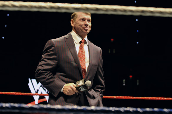 WWE Chairman and CEO Vince McMahon speaks to the audience during a WWE Fan Appreciation Event in 2010.