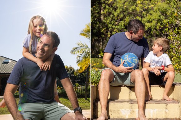 Daughter Annabel, whose hairband gift adorns his wrist; in the backyard with older son Leo.