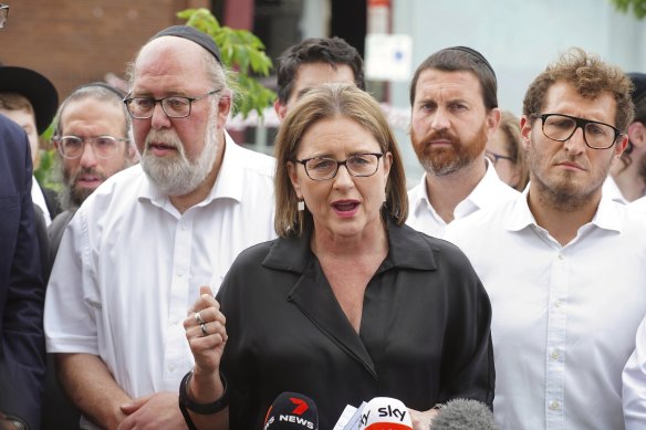 The premier with Jewish community leaders outside the Adass Israel synagogue.