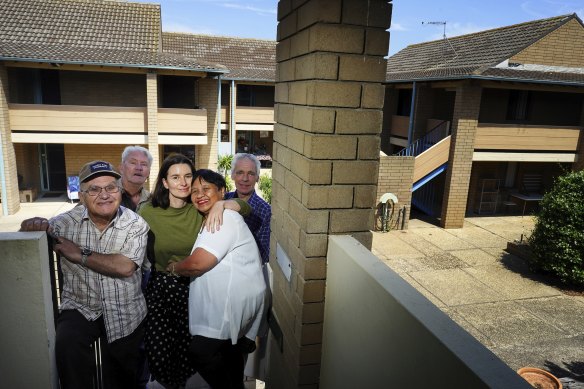 Techno Park Drive residents Vincent Schirripa, Arnie Hindhaugh, Lara Week, Nida and Matt Robinson