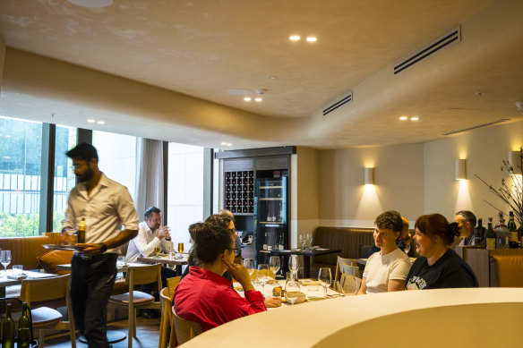 Curves, nooks and booths in Morena restaurant’s upstairs dining area.
