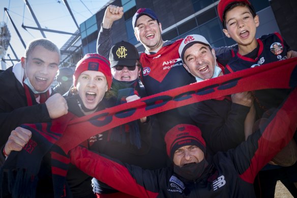Jordan McCleery (second from left) and fellow members of the Demon Army who headed to the ’G on Sunday to celebrate their team’s win.