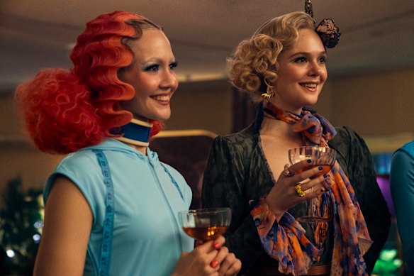 Elle Fanning (right) was cast as Effie Trinket after an online fan campaign. Iris Apatow as Trinket’s sister Proserpina is on the left.