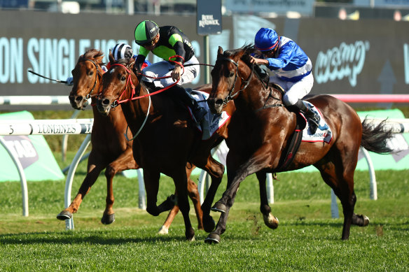 Sam Clipperton and Think About It (green and black) win the Premiere Stakes, holding off Hawaii Five Oh at the finish.