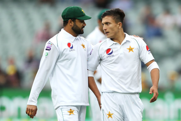 Pakistan captain Azhar Ali speaks to debutant Muhammad Musa whose short-pitched bowling was punished by Australia's batsmen.