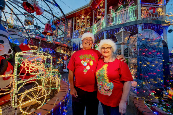 Tony and Matilde Filippini get into the Christmas spirit out the front of their well-lit Thomastown home.