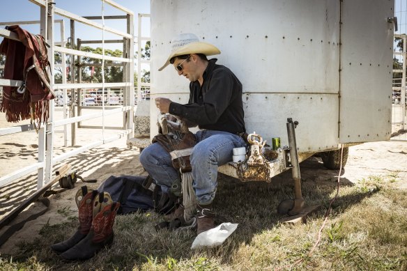 Bareback rider Luke Higgins, of Licola, who competes internationally, prepares to go on at Bunyip Rodeo.