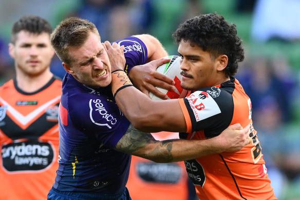 Shawn Blore is tackled by Cameron Munster earlier this year.