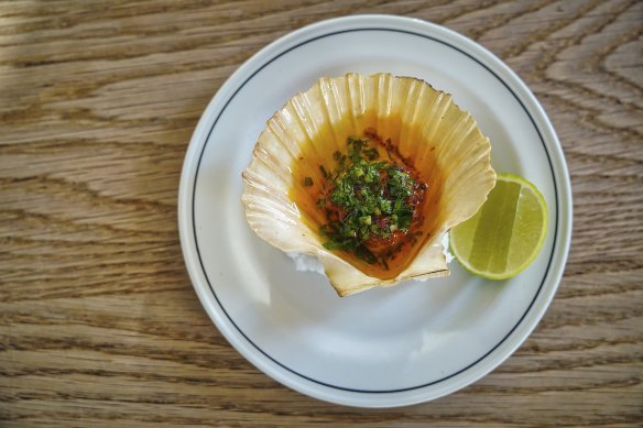 Scallop with spiced butter and lime.