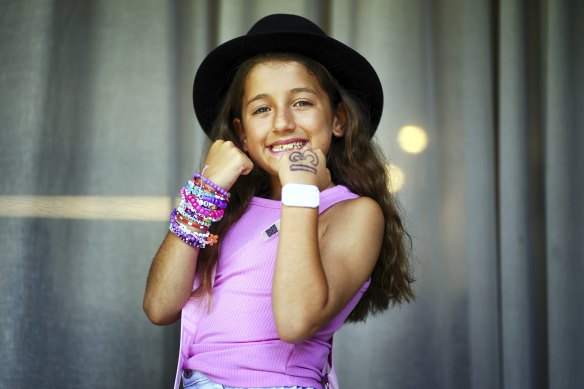 Milana Bruno, 9, wearing the black top hat given to her by Taylor Swift at her MCG concert on Friday night,