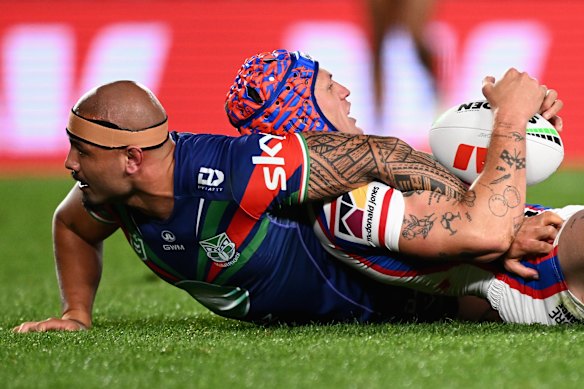 Kalyn Ponga and is tackled at Eden Park.