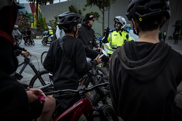 Jordan Forte speaks to police before leading a ride-out through Melbourne.