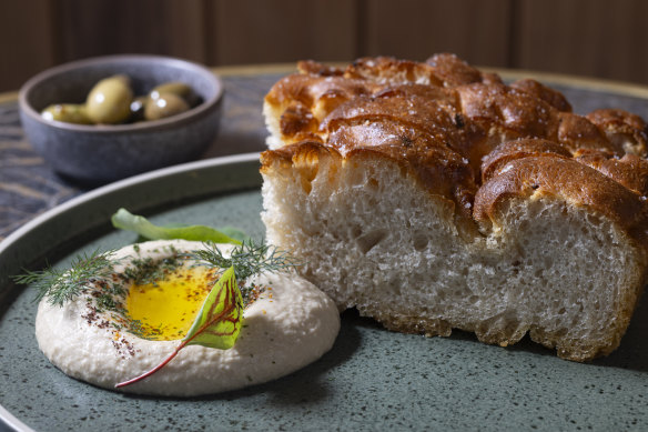 Foccacia served with a daily dip.