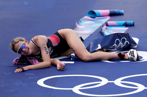 An emotional Cassandre Beaugrand celebrates her win in the women’s triathlon.