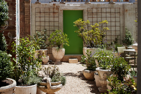 Concrete pots decorate the courtyard.