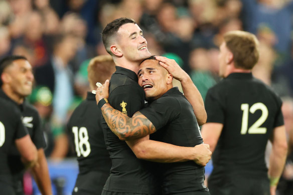 Will Jordan and Aaron Smith of New Zealand celebrate following the team’s victory.