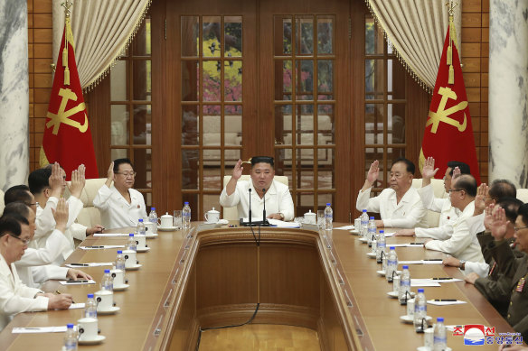 North Korean leader Kim Jong-un, centre, attends a meeting of his ruling party's political bureau in Pyongyang on Tuesday.