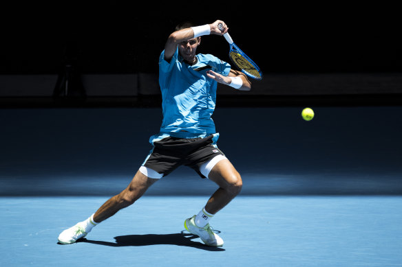 Alexei Popyrin spanks a forehand in his first round win over Marc Polmans.