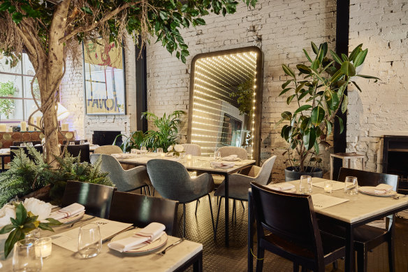 Rossi has replaced the industrial chic of Ladro TAP with plants and other soft touches.