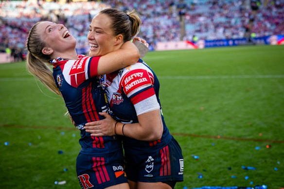 The Sydney Roosters celebrate winning the NRLW.