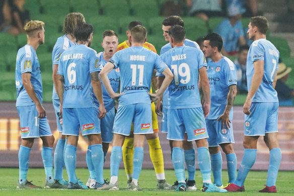 An agitated Scott Jamieson talking to teammates after Melbourne City conceded one of two late penalties last night at AAMI Park.