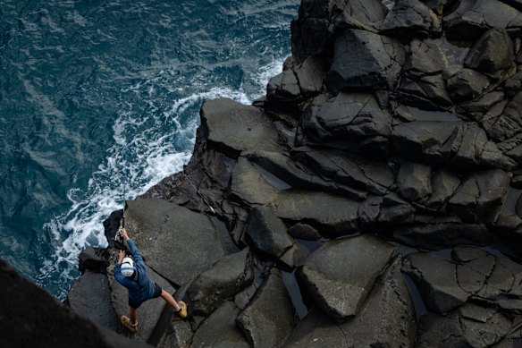 Tien Dat Do, a local fisherman, goes fishing near Headstone Point.