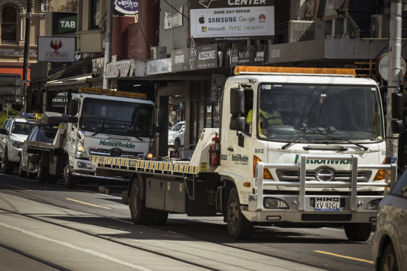 Nationwide Towing trucks looking for illegally parked vehicles on Sydney Road.