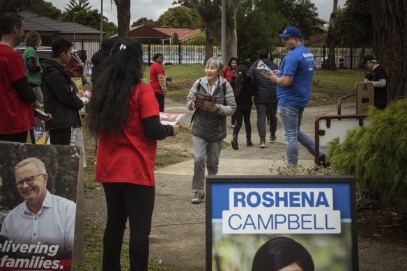 Voters arrive at the Knox Gardens Primary School polling booth.