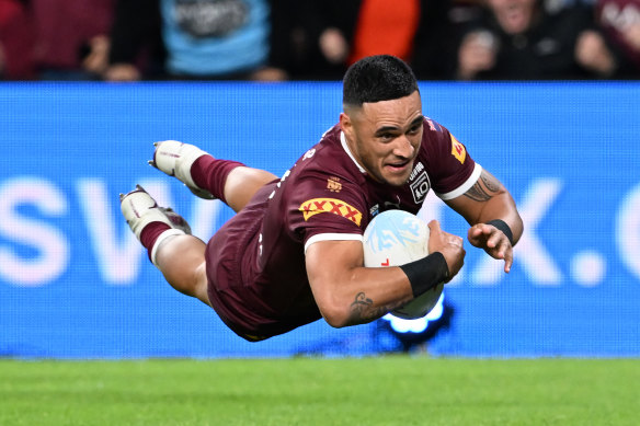 Valentine Holmes of the Maroons scores a try during game three of the State of Origin Series. 