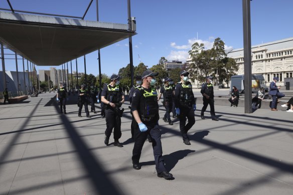 Police arrived at the Melbourne Museum vaccination hub at Carlton Gardens.