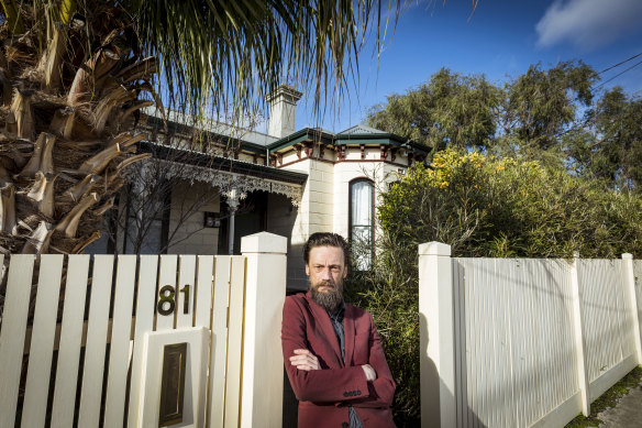 Heritage activist Adam Ford in front of an 1881 Ascot Vale home that was set to be razed to build three townhouses, in 2019.