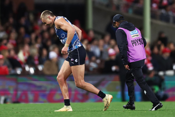 Carlton’s Patrick Cripps hurt his ankle.