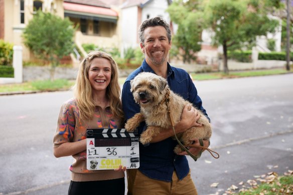 Harriet Dyer and Patrick Brammall (with Colin the dog) in season two of Colin From Accounts.