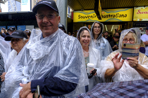 A very wet Melbourne Cup parade.
