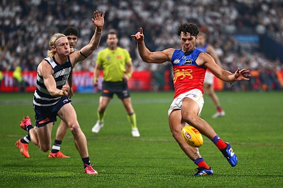 An in-form Cam Rayner gets a kick away.